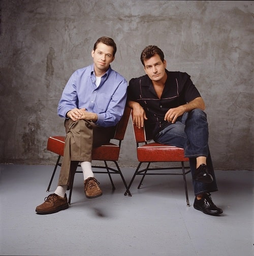 A picture of Jon Cryer with Charlie Sheen.